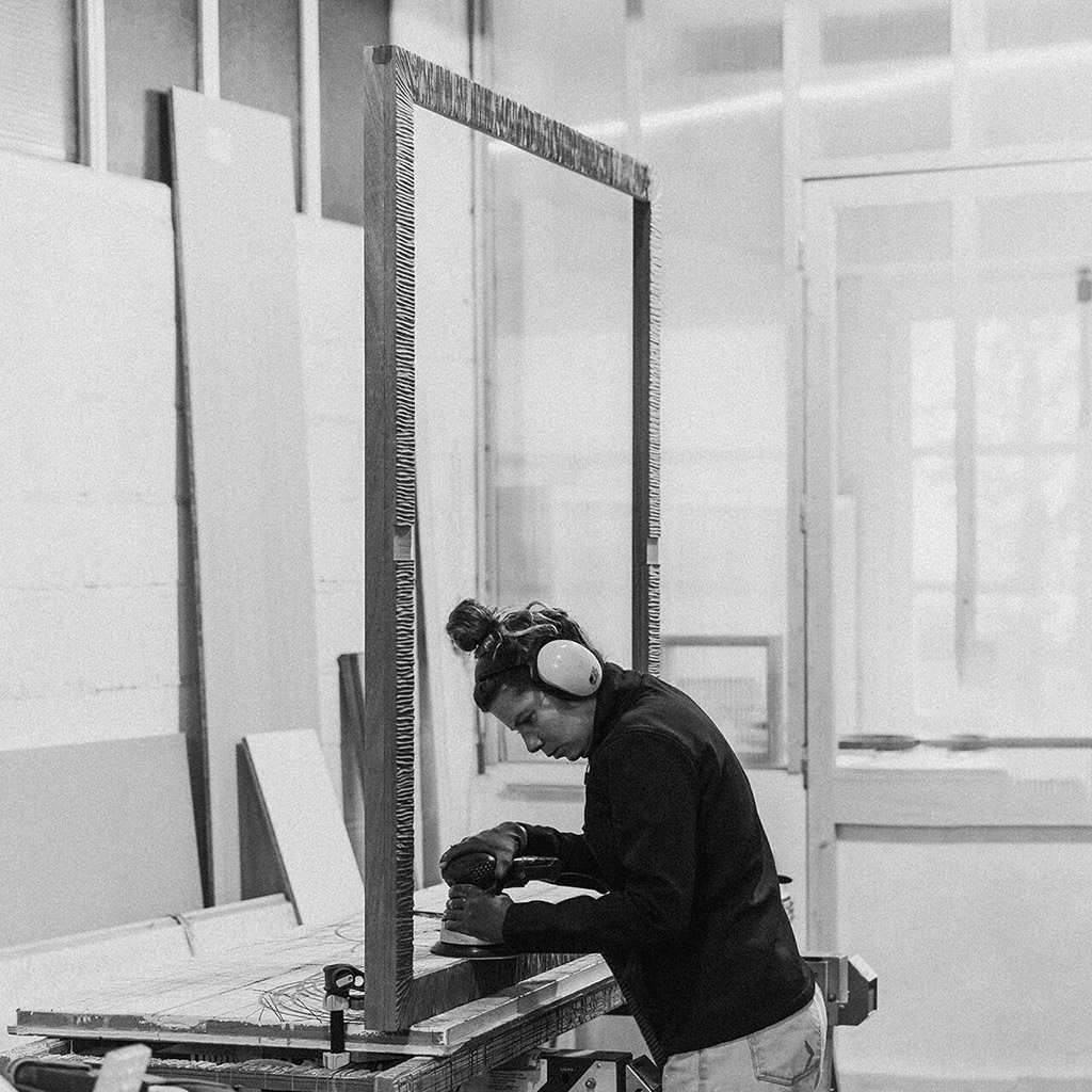 Teva making a bespoke mirror in the Atelier Teva Sian