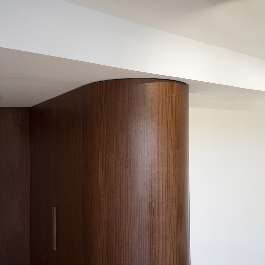 High-end interior design wooden curved wall by Atelier Teva Sian